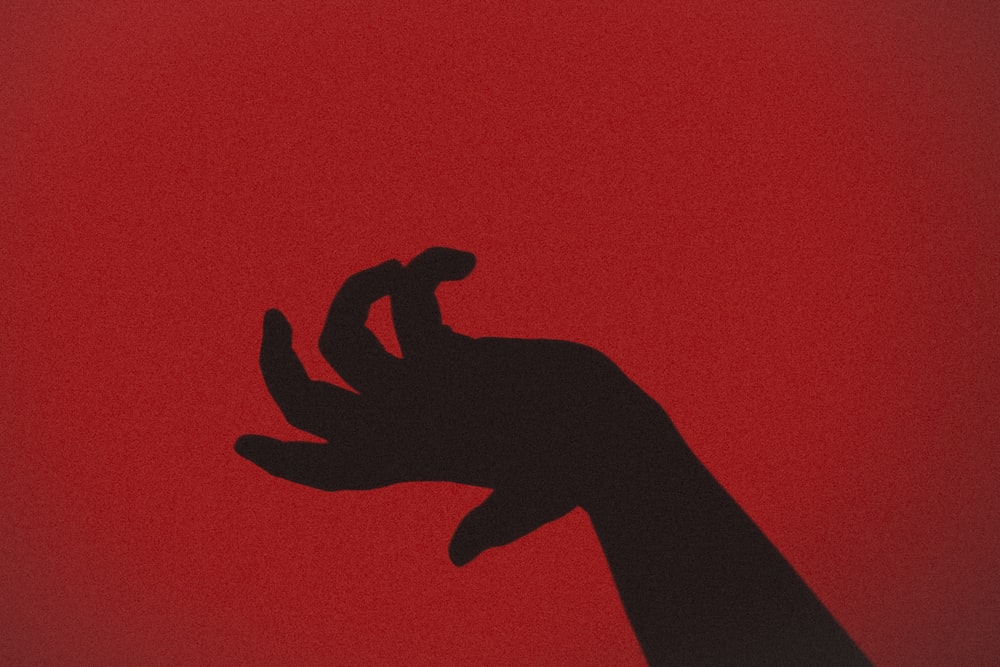 A person’s hand signifying homicide