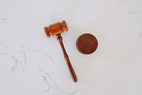 A judge's hammer and gavel