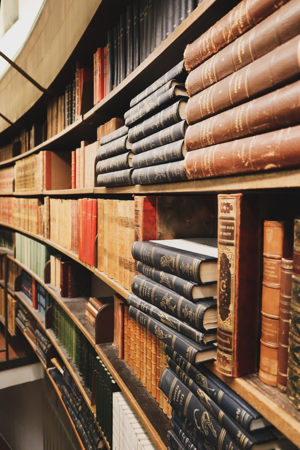 Books on a shelf in a court